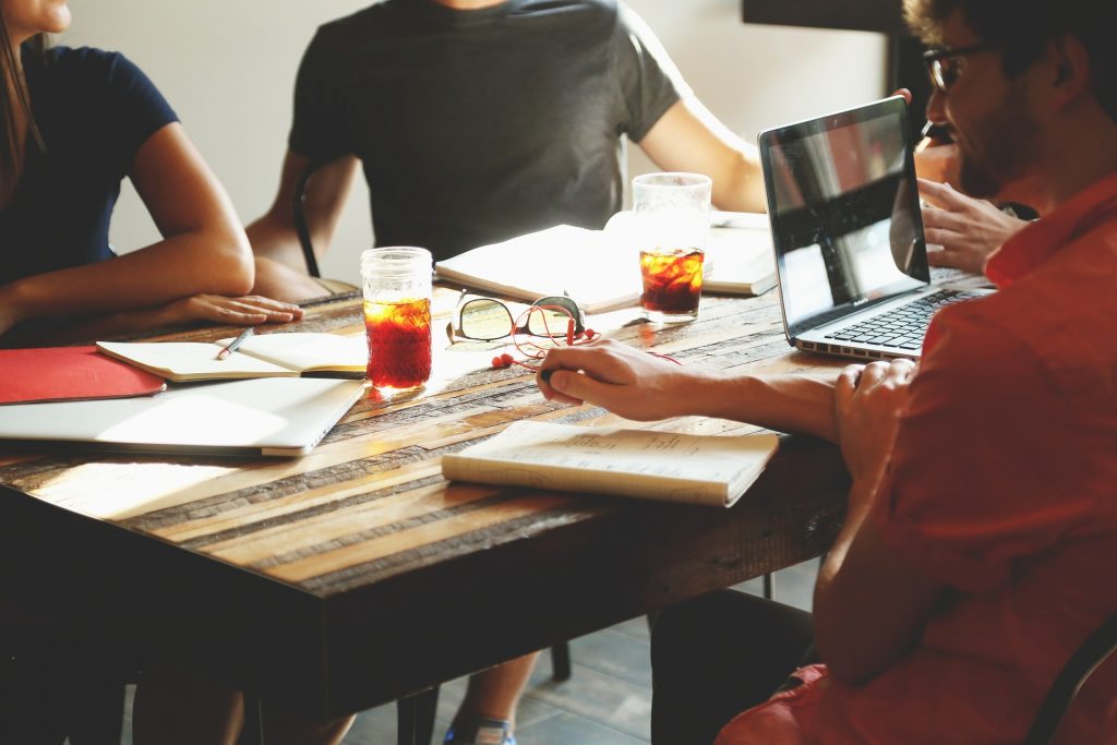 People sitting around a table collaborating